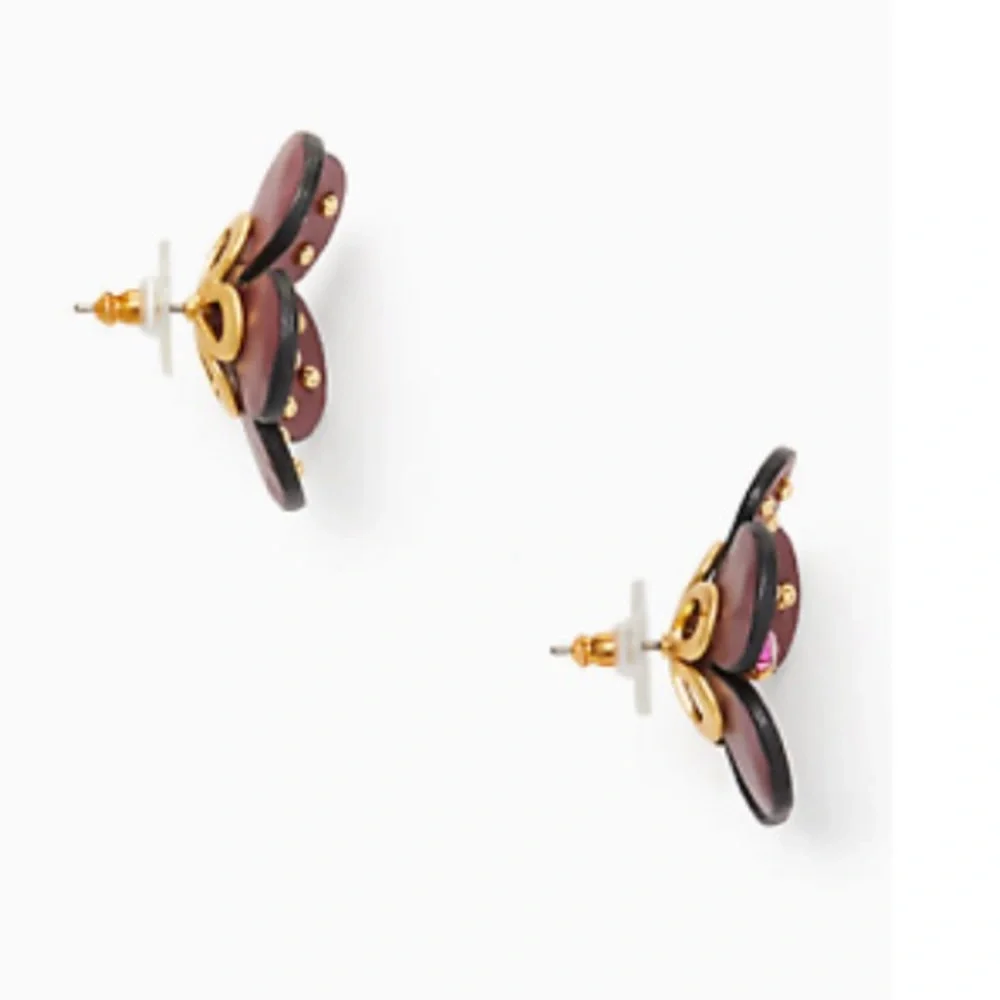 Kate Spade flower earrings. Burgundy leather with pink crystal centers. New!